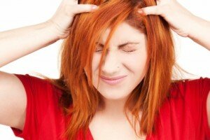 stockfresh_id15133_unhappy-redhead-woman_sizeXS