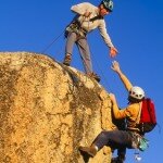 stockfresh_id704464_rock-climbing-team-reaching-the-summit_sizeXS