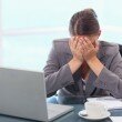 Frustrated businesswoman crying